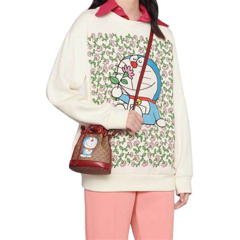 doraemon x gucci mini bag|Gucci Doraemon sweater.